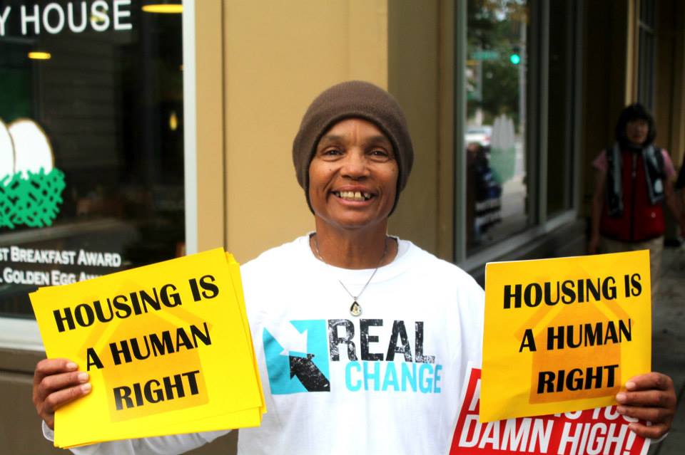 Sharon Jones protests a plan to turn low-income housing into for-profit housing. Image credit: Tenants Union of Washington.