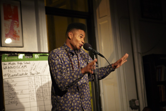 A storyteller spins a yarn at an event hosted by The Moth. Photo credit: Jason Falchook.